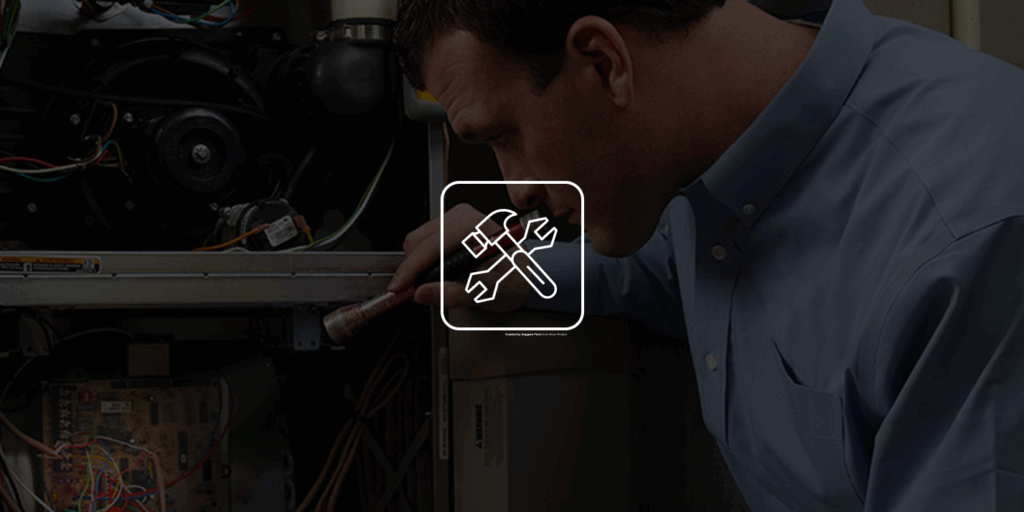 Technician performing commercial HVAC repairs in Ontario GTA