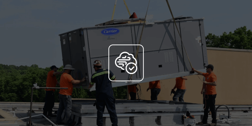 Technician performing HVAC retrofit and replacement in Ontario GTA, An expert TRI-AIR SYSTEMS HVAC technician performing maintenance to ensure long-lasting system performance in Clarington ON
